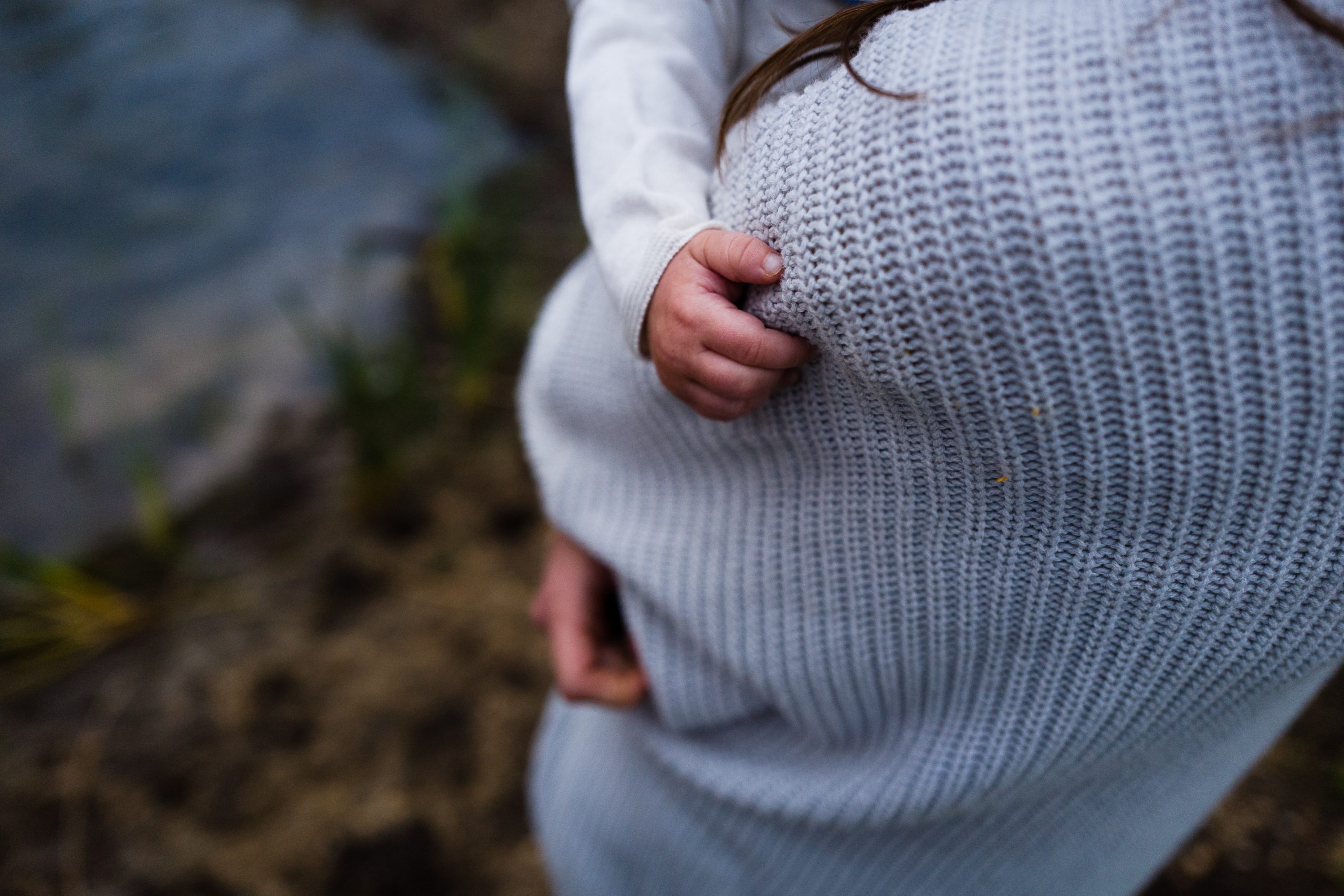 parenting holding baby during postpartum period.