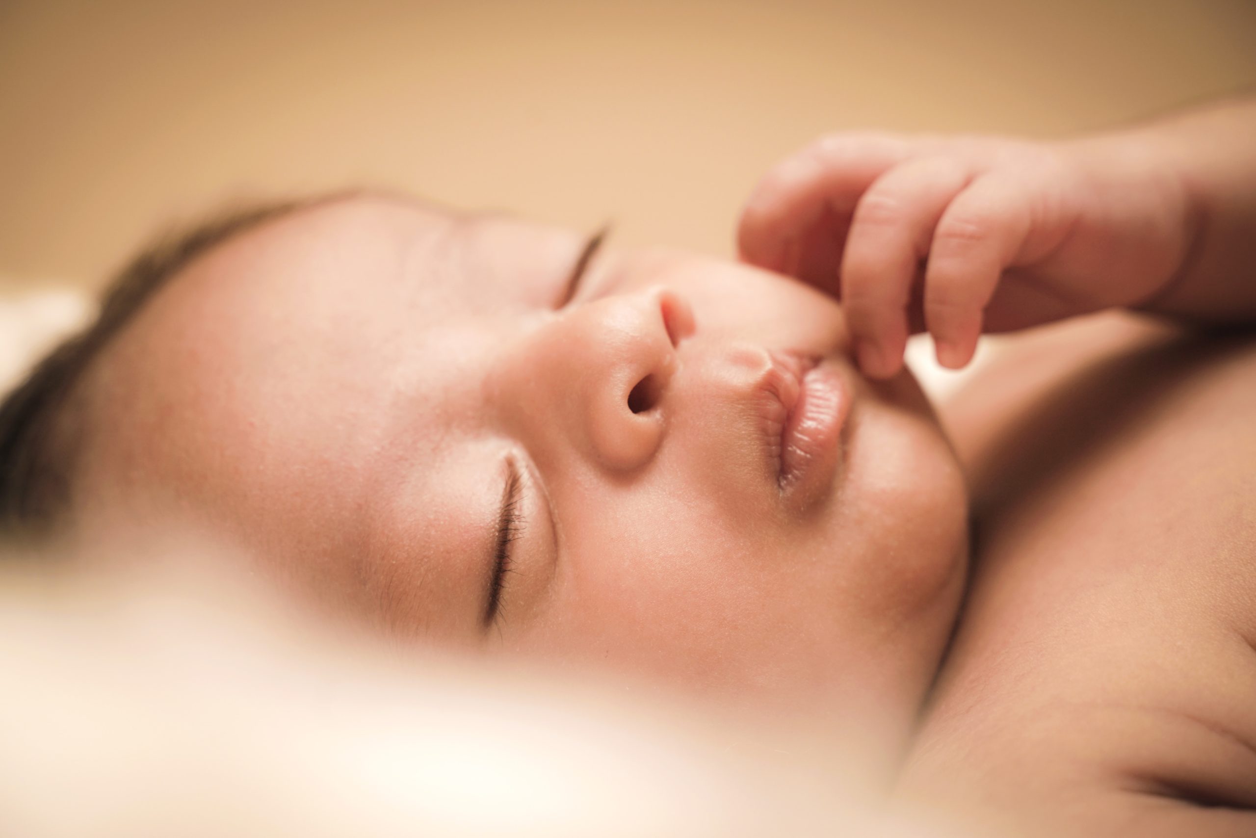 Close up photo of baby sleeping.